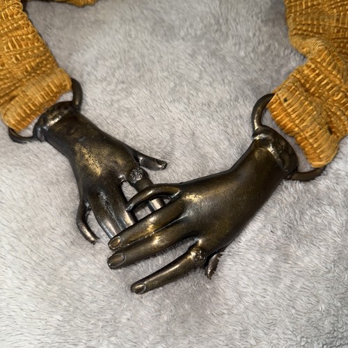 Vintage 1960s clasping hands - clasping,