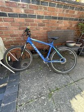 blue and green Carrera mtb M/L