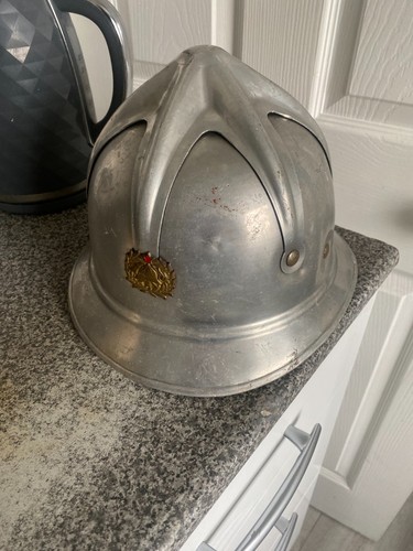 Two vintage helmets see - ,