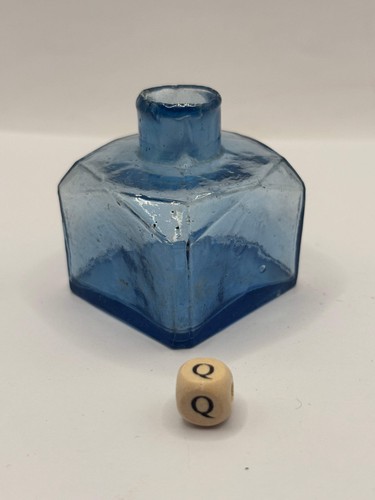 Old blue glass ink bottle