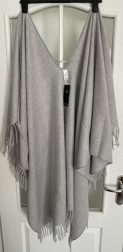 Knitted poncho marks - knitted,
