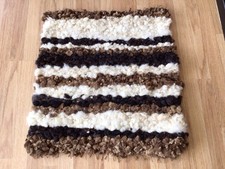 Gorgeous black, white and brown peg loom woven wool rug