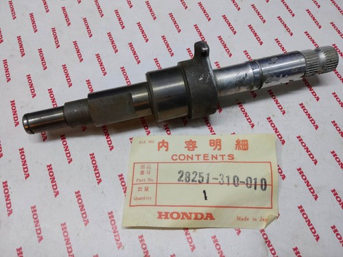 Kick mechanism shaft for