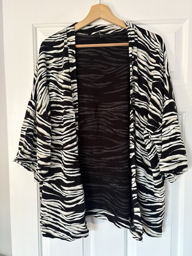 Next size large black - next, &