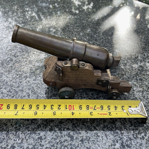 Brass cannon wooden wheeled - cannon, on