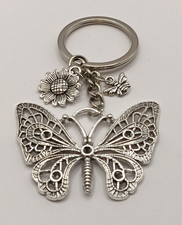 Stainless steel Butterfly keyring with mini flower charm