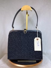 Vintage black Peter Lord