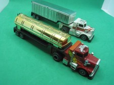 TCR-  pair of Trucks with traliers - power applied motor + lights