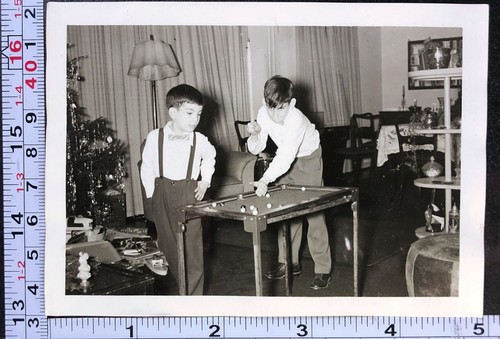 Two children shooting - two,