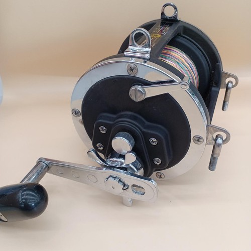 Daiwa black conventional reel - daiwa,