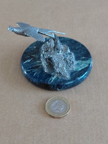 Pewter statuette rising - a,