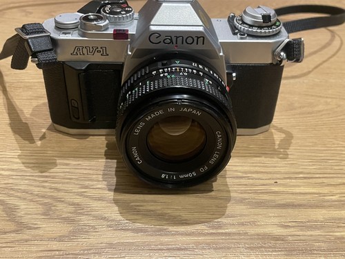 Canon slr film camera - av-1,