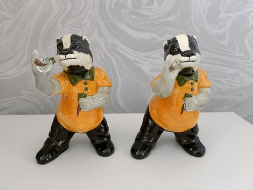 Dart playing badger figurines