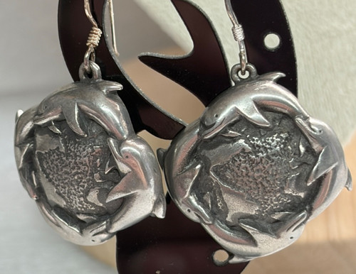 Celtic dolphins round globe - dolphins,