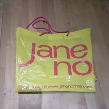 Jane Norman String Handle