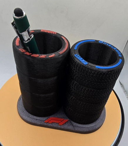 Tyre pen holder with - f1,
