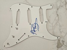 Signed George Benson guitar scratch plate
