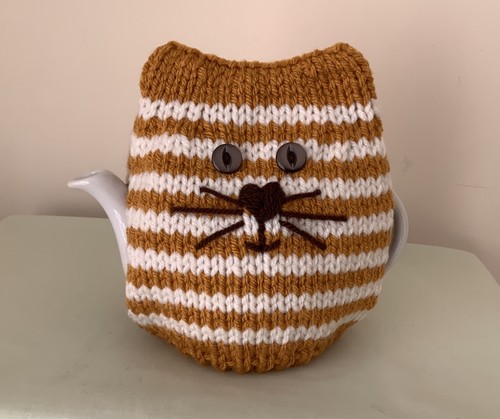 New hand knitted gold ivory - new,