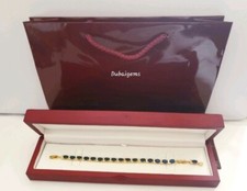 Blue sapphire oval tennis