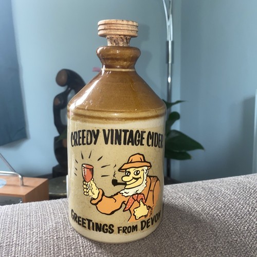 Stoneware flagon creepy - flagon,