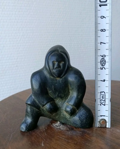 Inuit art figure seated - of,