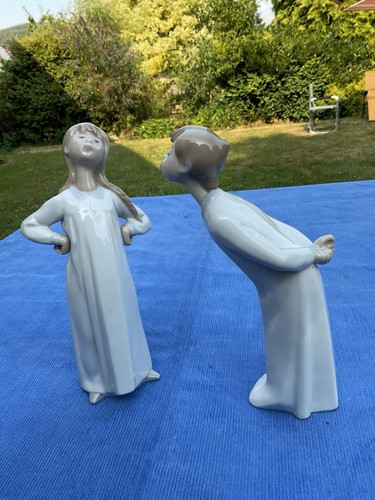 Lladro girl with hands hips - on,