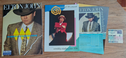 Elton john programmes - john,