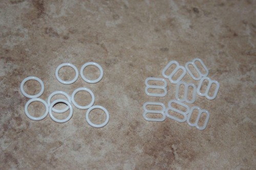 Pieces white plastic bra - pieces,