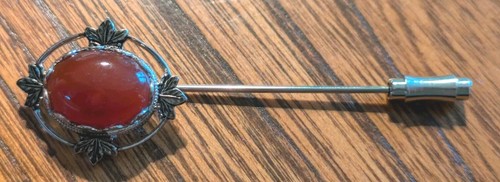 Silver tone hatpin with amber - with,