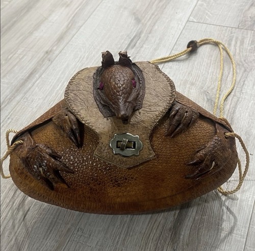 Armadillo leather purse hand