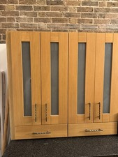 2 X 600mm Wide Oak And Glass Dresser Units