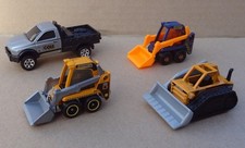 Matchbox - RAM flatbed + Skidster + Mini Dozer - MBX Construction (4x cars)