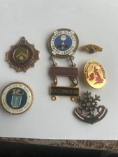 6 collectable enamal sports badges,football,bowls,skiing.