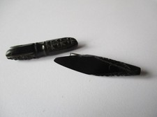Whitby Jet brooches x 2