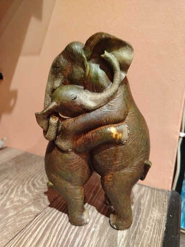 Hugging standing elephant - hugging,