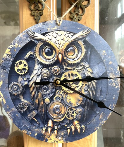 Clock steampunk owl with cogs