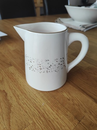 Decorative white jug with - decorative,