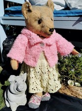Hand knitted teddy bear