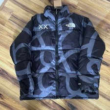 The North Face x KAWS Blue & Navy Puffer Jacket – Size Small – Brand New