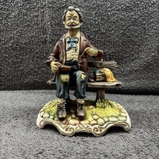 Figurine in a Capodimonte Style 'Old Man having a picnic on a Bench'