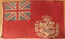 Antique Red Ensign Flag with Canadian Coat of Arms. 31 inches by 19 inches.