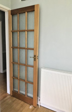 internal door - solid stained hardwood with obscured glass.  Collection only