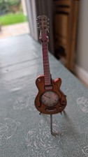 Miniature Ornamental Guitar Novelty Red Tone Collectors Clock on Stand