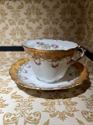 Vintage teacup and saucer - and,