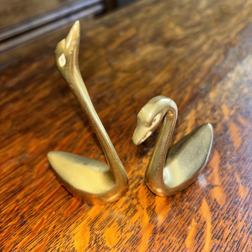 Pair vintage brass swans - pair,