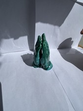 Figurine of Praying Hands, often used as a decorative item with symbolic meaning