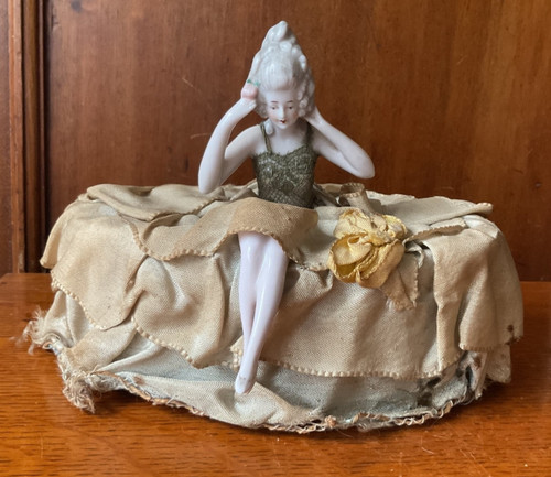 Antique porcelain half doll - half,