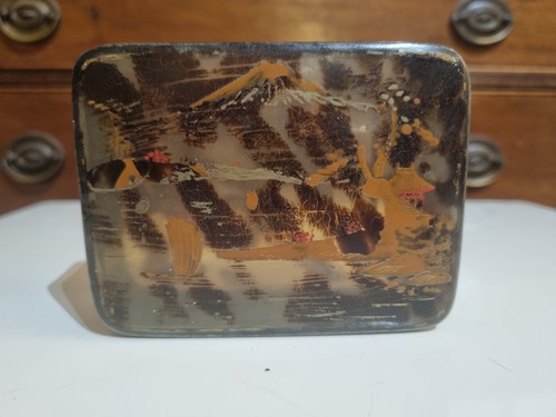 Asian lacquered faux - an,
