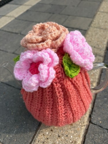 Crochet knitted tea cosy