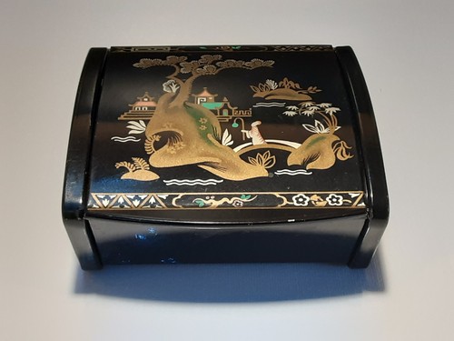 Vintage black lacquered on - a,